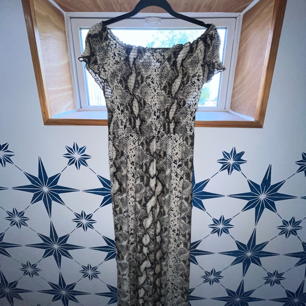 One piece jumpsuit snakeskin pattern very cute just too tall for me